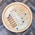 Top-down view of round wooden Farkle tray with laser-engraved rules and blue dice - 18cm / Farkle Dice Tray (Includes Dice)