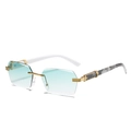 Rimless gradient blue sunglasses with asymmetric white and marble textured temples - Gold Frame Light Green Gradient Lens White Marble Temple