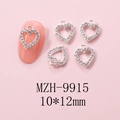 Macro shot of 10*12mm silver heart nail art charm with rhinestones on pink nails - Silver Heart Pave Rhinestone Charm (9915)