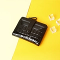 Short black crocodile pattern bifold wallet with snap closure on decorative ice background - Black
