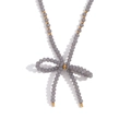 Minimalist beaded necklace with grey crystal beads and a golden bow pendant - Light Gray (N3260)