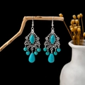 Vintage silver ethnic earrings featuring turquoise beads and hollow floral pendants - E5939/Retro Hollow Leaf Blue Bead