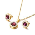 Parure dorée avec pendentif en cristal fuchsia rond et boucles d'oreilles assorties - Violet