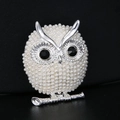 Elegant owl brooch with white faux pearls and black rhinestone eyes on a branch - Silver Pearl Owl