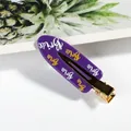 Purple resin hair clip with Bride lettering and gold metal duckbill clamp base - BRIDE