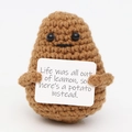 Handmade brown crochet potato plush toy with encouraging quote sign on white background - Potato L Card