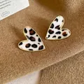 Elegant heart-shaped leopard print earrings with gold frames on a brown textured background - 31# Silver Needle-Gold-White-Leopard Heart