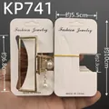 White cardboard jewelry display card with gold rectangular pearl hair claw clip - Approximately 100 Kp741 Cards