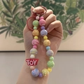 Handmade striped bead keychain with colorful toy letter pendant and pink metal hook - TOY Letter Macaron