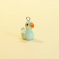 DIY glowing mini resin duck charm in light blue with orange beak and silver metal ring - Solid Light Green (Silver Pin)