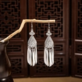 Ethnic silver-style peacock tassel earrings with hollow leaf design on wooden branch - Silver Teardrop Hollow Willow(E5304-1)