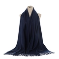 Close-up of navy cashmere scarf showing fringe detail and soft knitted fabric texture - Navy Blue