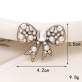 Vintage gold bow charm with white pearls and rhinestones, size 4.2cm by 3.5cm - D1727 Pearl Bow Ribbon