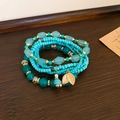 Bohemian mehrlagiges Sandelholz-Perlenarmband mit Türkissteinen und goldenen Blattanhängern - Grün