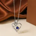 Titanium steel heart necklace with blue gemstone and rose detail in silver finish - Steel Blue Stone Necklace N0451S
