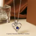 Titanium steel heart necklace with blue gemstone and rose detail in silver finish - Steel Blue Stone Necklace N0451S
