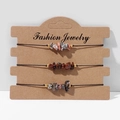 Three-piece irregular natural stone bracelets set with black adjustable cord on card - FK0052 Earthy Pink Crushed Stone Set