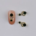 Golden nail alloy charm with green gemstone and clear rhinestones for nail art - Gold Metal Green Gemstone Combination