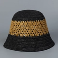 Dettaglio cappello a secchiello in paglia intrecciata con motivi traforati neri e marroni - M (56-58cm) / Nero