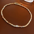 Baroque pearl necklace with light blue and reddish-brown beads and gold-tone lobster clasp - Baroque Pearl Abacus Bead Faux Jade Necklace