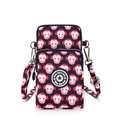 Navy blue nylon crossbody phone bag with red monkey pattern and adjustable strap - Smiling Face Monkey