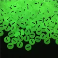 Close-up of luminous acrylic beads with black striped patterns glowing in the dark - Letter I (100Pcs/Pack)