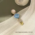 Elegant 6cm gold alloy hair clip with pink glitter discs and blue textured rhombus accent - Light Blue Geometric Mixed