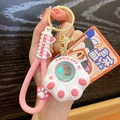 Pink and white cat paw keychain with liquid quicksand and silicone strap - White