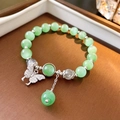 Beaded bracelet with green cat-eye stones and a sparkling zircon butterfly pendant - Green Butterfly Style (56 Bracelet-Green)