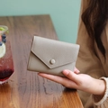 Slim light gray pebbled leather tri-fold wallet for women with envelope snap closure - Elephant Gray