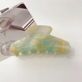 Detail of starry marbled hair claw clip with blue and orange acrylic textures - 11cm Trapezoidal / Starry Yellow