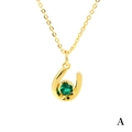 Elegant gold horseshoe necklace with a central round green gemstone pendant - Green Zirconia