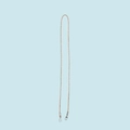 Macro shot of sparkling rose gold rhinestone phone strap with silver metal hooks - Pink