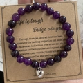 Purple amethyst beaded bracelet with silver heart charm on vintage kraft card - Amethyst Heart With Card Style