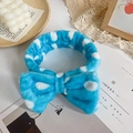 Blue plush headband with white polka dots and a large decorative bow for skincare - Blue Polka Dot
