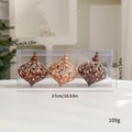 Drie holle geweven kerstballen in koffie en roségoud met parelmoeren accenten - Bruine Opengewerkte Set 3 Stuks