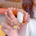 Bracciale di pietre del sole rosa con ciondolo a cavallo a dondolo smaltato oro - Stile Cavallo a Dondolo in Pietra di Sole Naturale