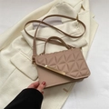 Chic beige quilted crossbody bag with metal bar detail and elegant top handle for women - Khaki