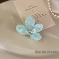 Irridescent butterfly hair claw clip in light blue pearlescent finish, approx. 5.5cm - Blue Small Flower