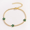 Bracciale placcato oro con zirconi bianchi e tre ciondoli a fiore verde - Verde