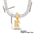 Gold letter K pendant necklace with rectangular zircon crystals on a tennis chain - Letter K
