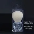 Pinceau maquillage forme pomme avec manche transparent et poils blancs synthétiques - Pinceau Pomme En Pvc Transparent Couleur Assortie