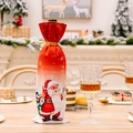 Christmas wine bottle cover with Santa Claus print and golden ribbon closure - Santa Claus