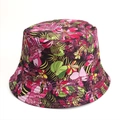 Detailed top view of the vibrant floral print on a cotton reversible bucket sun hat - Pink Green Yellow Tropical Floral (Style D)
