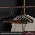 Solid beech wood and black iron wide shoulder suit hanger in walnut finish, 42cm length - Iron Beech Wood Wide Shoulder Hanger / Walnut