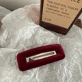 Close-up of a burgundy velvet rectangular hair clip with metallic hollow design - Square / Burgundy