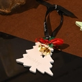 White Christmas tree plaster ornament with red bow and gold bells on black ribbon - Gardenia
