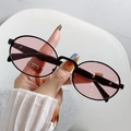 Retro small oval sunglasses with pink lenses and a sleek black metal frame for fashion - Black Frame Pink Lens