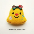 Dettaglio di un campanello natalizio in peluche giallo di 5 cm con fiocco a quadretti - Campana di Natale / Originale (Apertura posteriore)