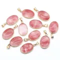 Bulk set of eleven pink strawberry quartz oval pendants with golden metal edging - Watermelon Red (Synthetic)